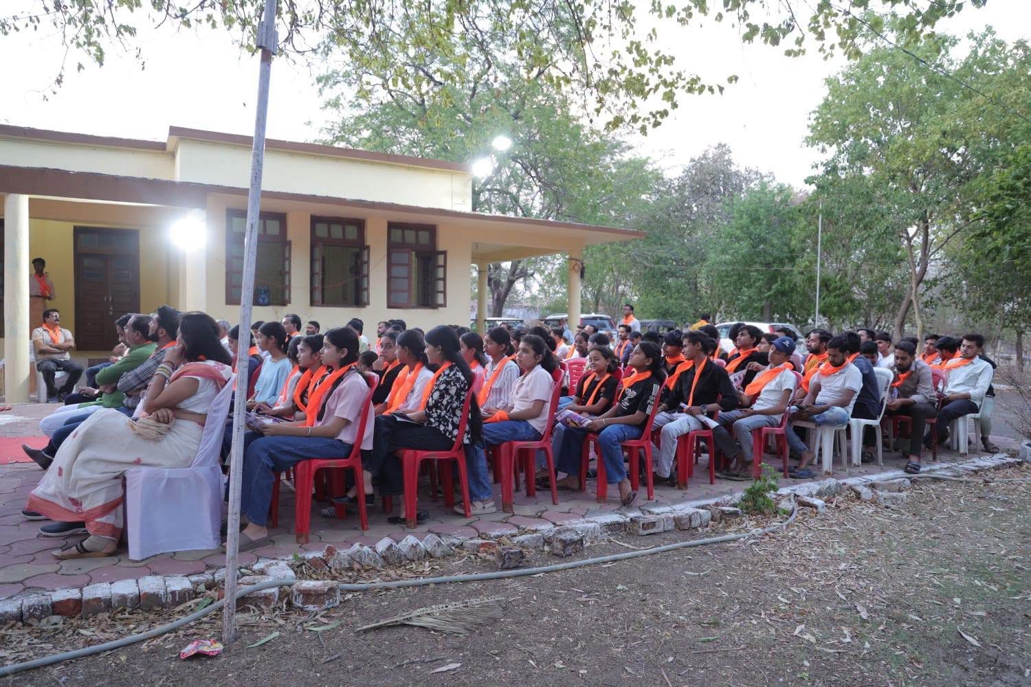 Young participants listening to the speakers